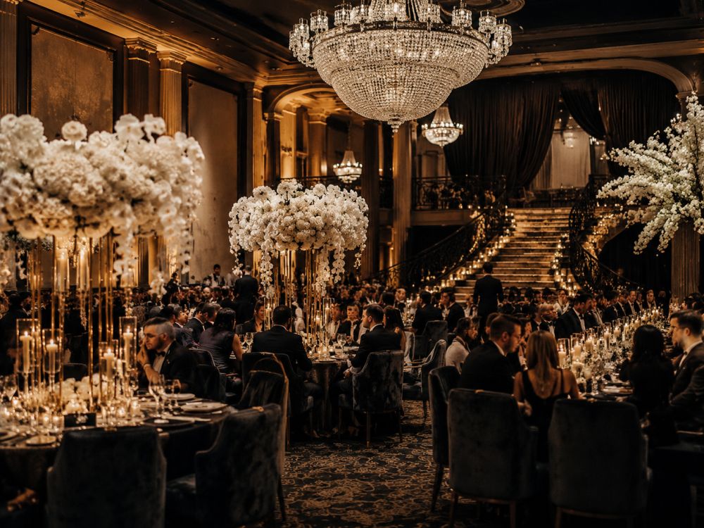Elegant Melbourne winter wedding reception featuring candlelight, chandeliers, luxury styling, and intimate atmosphere.