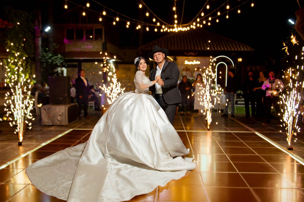 Newly married couple enjoying a beautifully organised wedding reception after selecting the perfect venue style