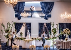 floral setting bride groom on balcony