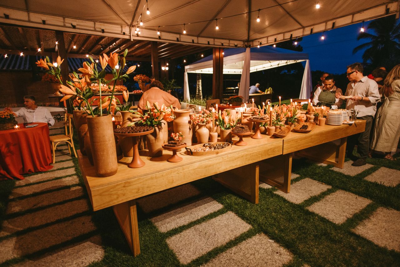 Wedding guests enjoying late-night sliders and comfort food after dancing at a Melbourne reception