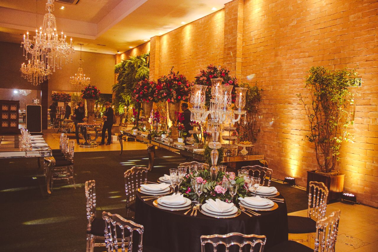 Professional wedding venue team preparing an elegant all-inclusive reception space in Melbourne