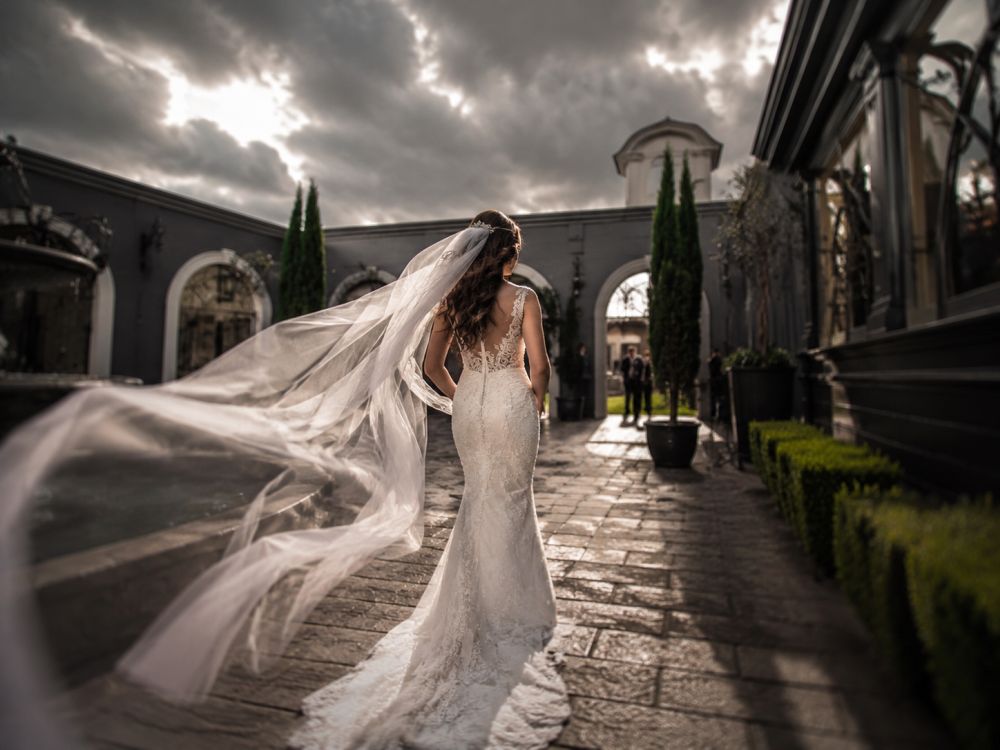 Bride preparing for a Melbourne wedding ceremony while adapting to changing weather.