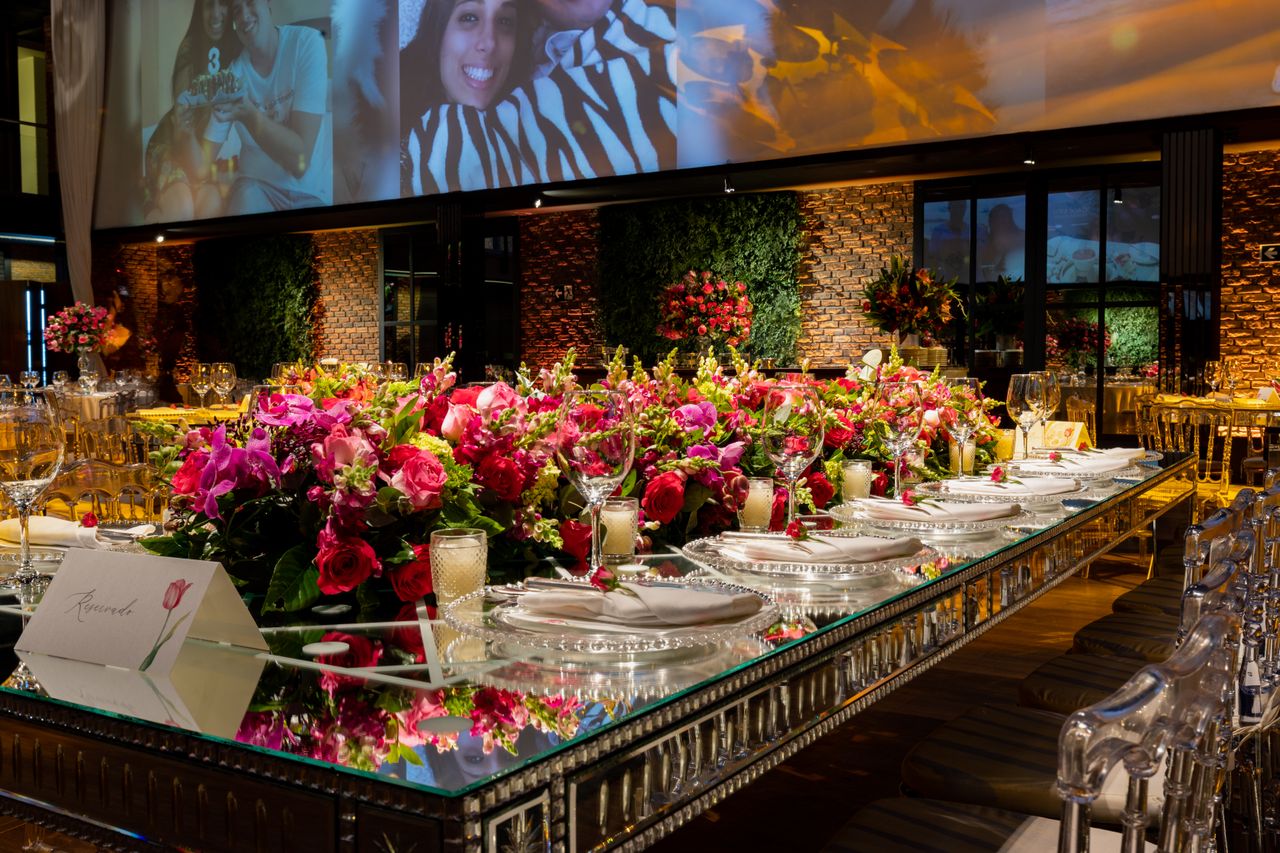 Close-up of wedding planning materials and reception décor representing venue decision preparation.